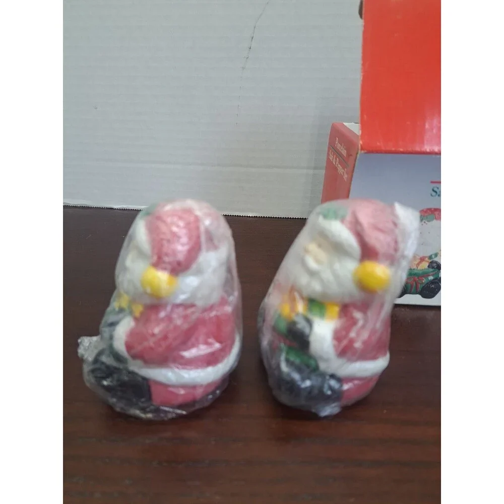 Set Of Porcelain Santa Salt And Pepper Shakers
